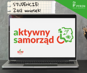 Pokaż zdjęcie: Otwarty laptop. Na ekranie widoczny napis "Aktywny samorząd" 