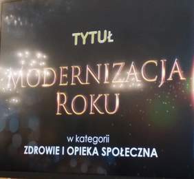 Pokaż zdjęcie: Slajd z napisem: tytuł Modernizacja Roku w kategorii zdrowie i opieka społeczna