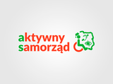 Czerwony napis, zielona ikona symbolizująca osobę na wózku
